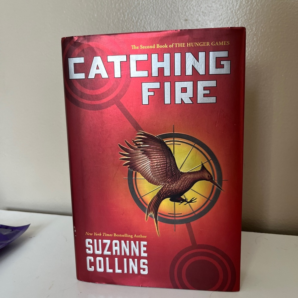 Catching fire by Suzanne Collins